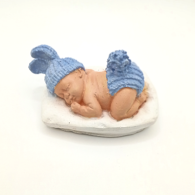 Dekorative schlafende Babyfigur